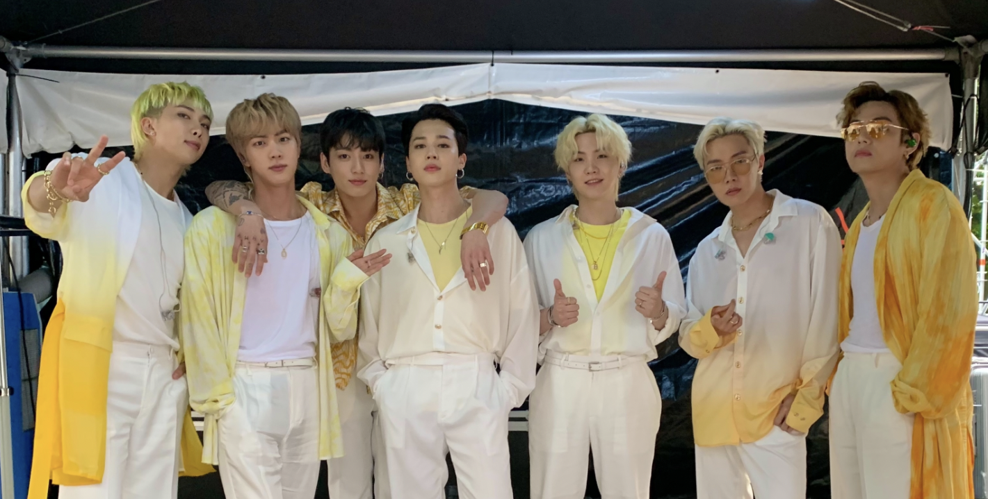 BTS Sowoozoo Concert group photo in yellow and white