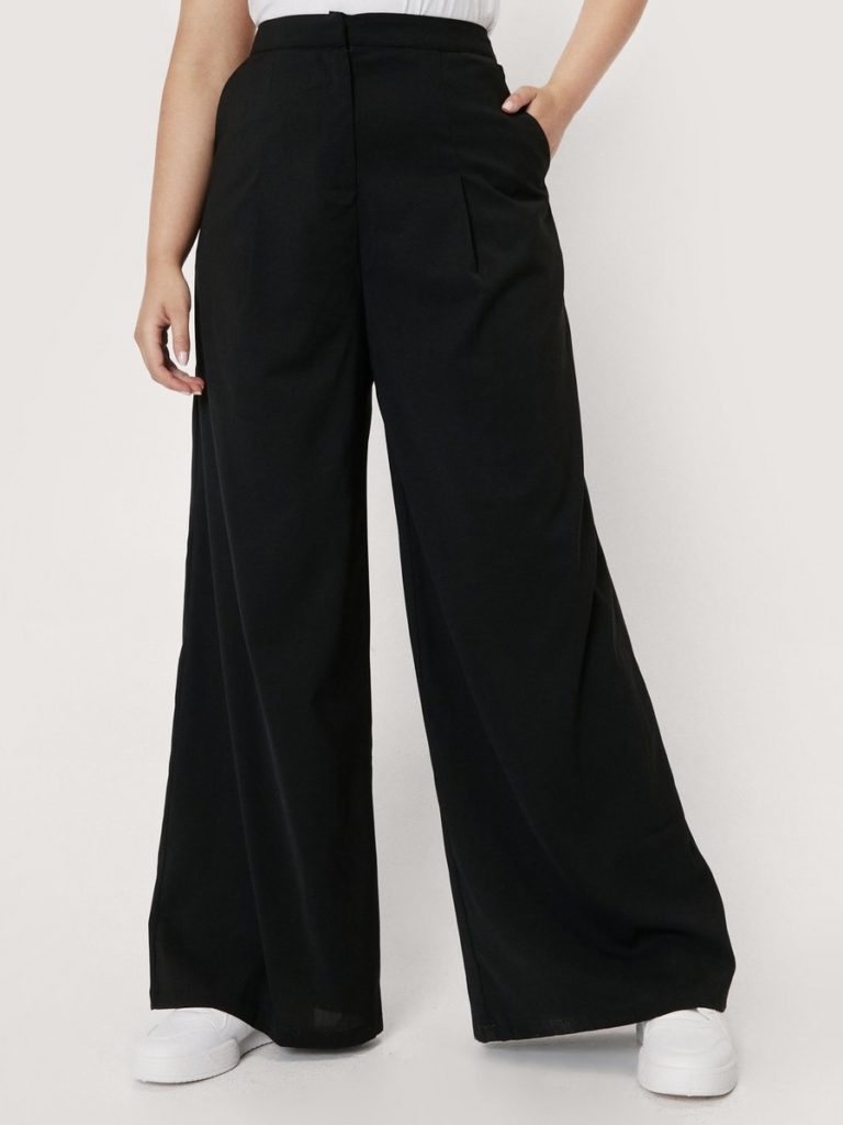 A pair of black high-waisted wide leg pants.