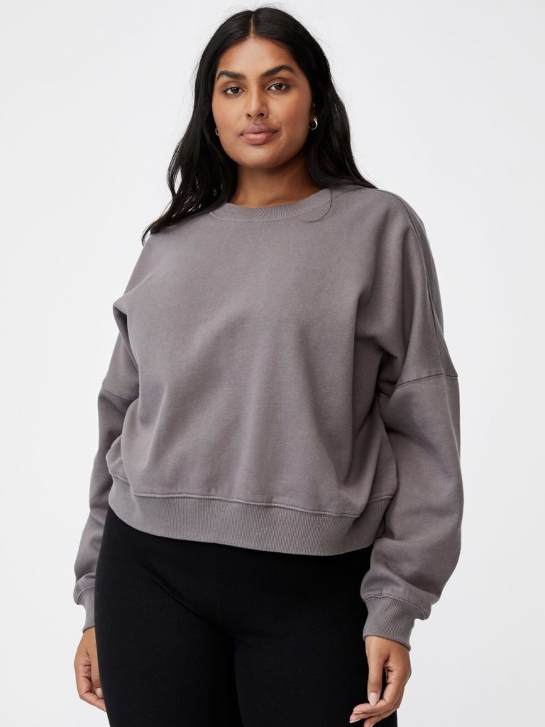 A long-sleeved gray pullover.