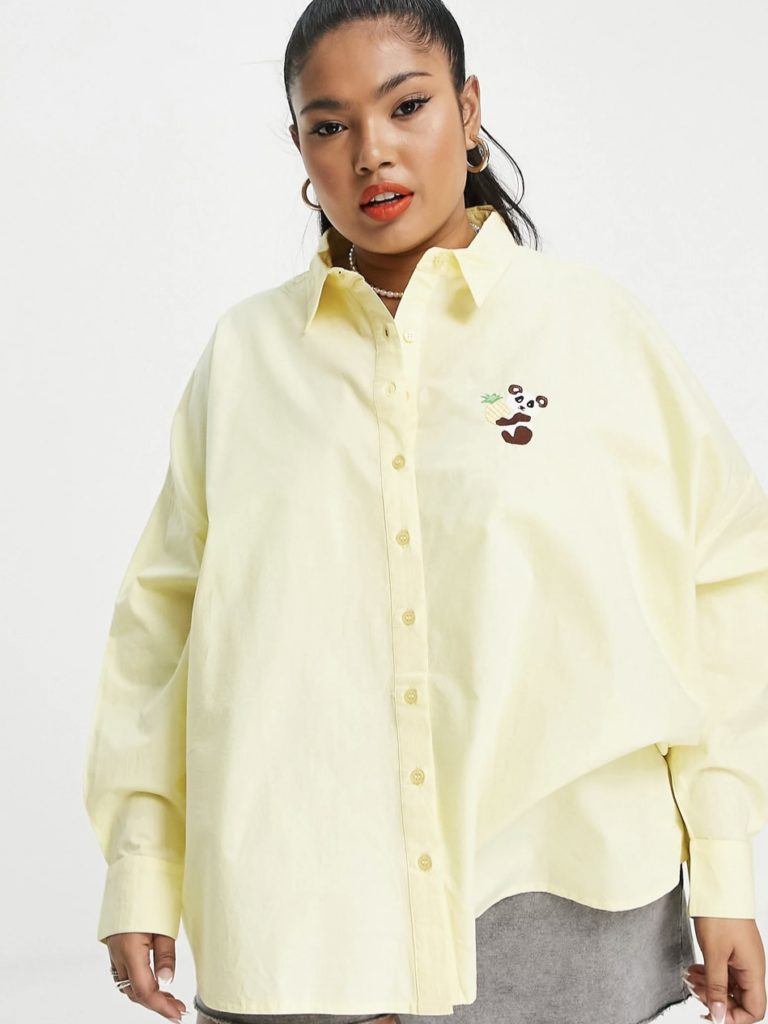 A light yellow long-sleeved button-up shirt.