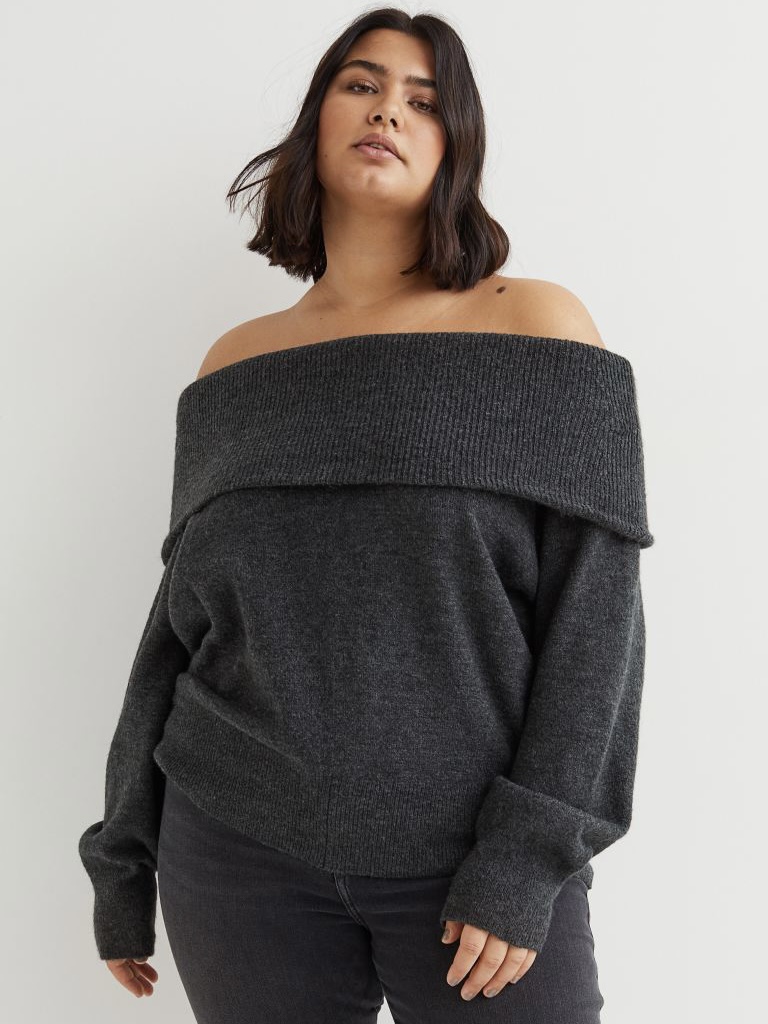 A dark gray off-the-shoulder sweater.