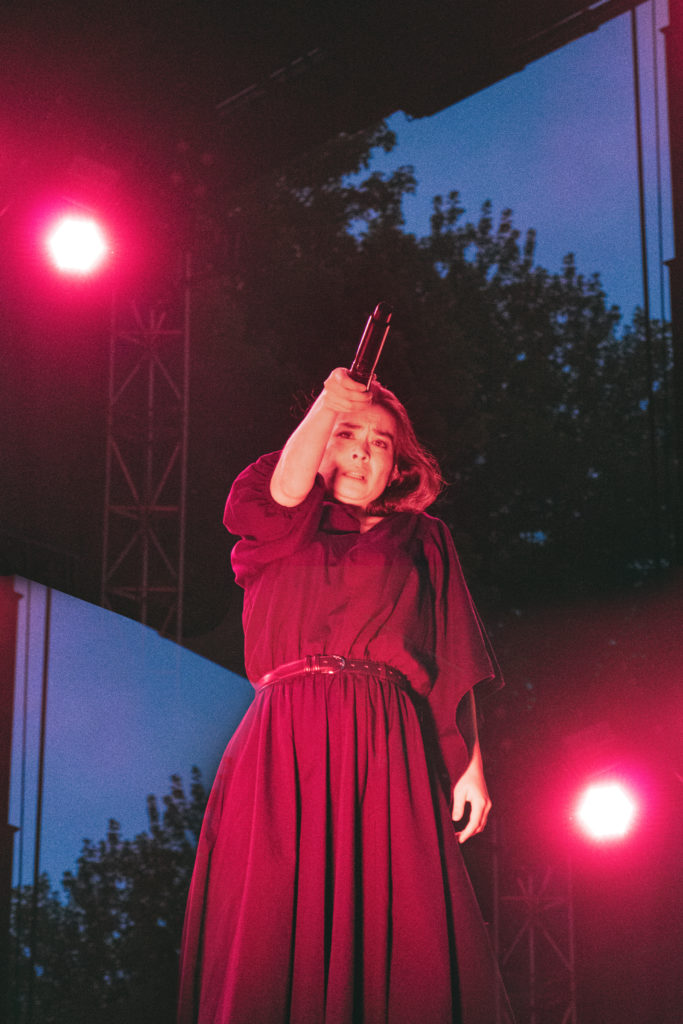 Left and right pictures: Mitski performing at the 2022 Pitchfork Music Festival.
