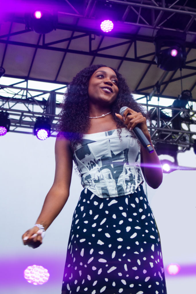 Left and right pictures: Noname performing at the 2022 Pitchfork Music Festival.