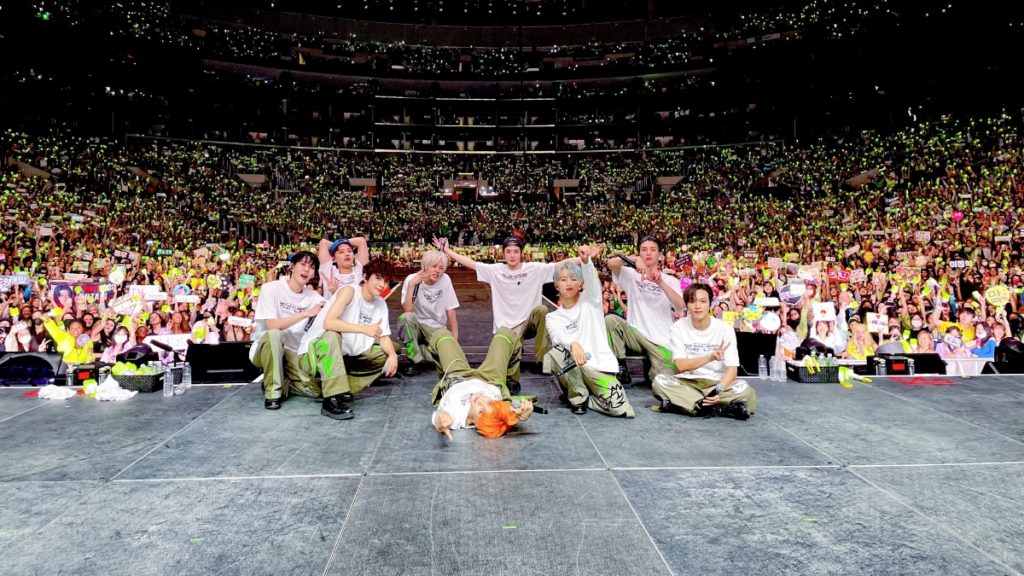 NCT 127 in their Los Angeles concert, posing with all the audience in the arena.