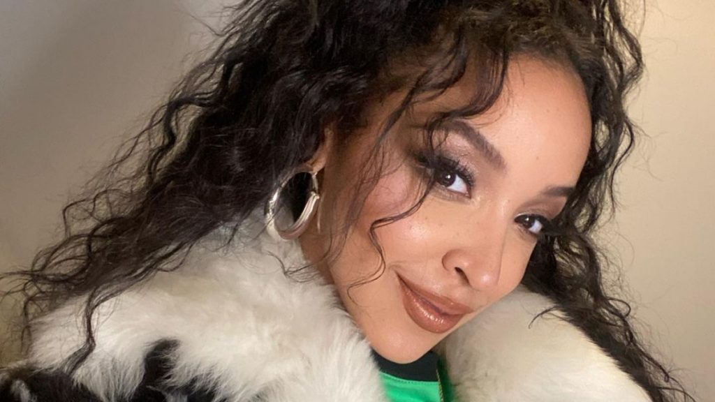 A close-up selfie of Tinashe.